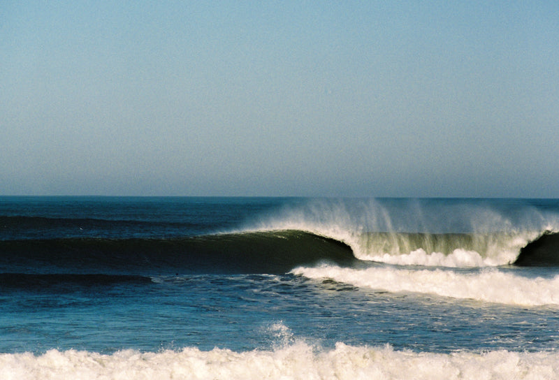 Surfer watching the lines of swell before getting in the water